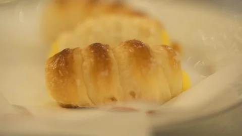 Sausage rolls on plate Stock Footage 108731357
