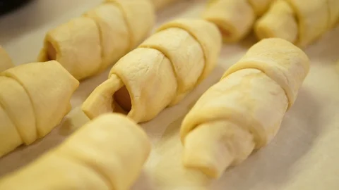 Sausage Rolls wrapped. Chef preparation of Buns at home. Homemade dishes Dough. Stock-Footage 129094757
