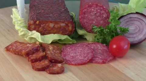 Sausage of salami on a cutting board 스톡 동영상 56646293
