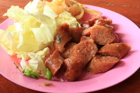 Sausage with vegetables. Stock Photos