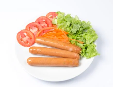 Sausage with vegetables Stock Photos