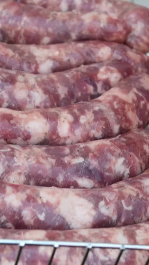 Sausages are cooked on grill on fire at Food Festival Stock Footage 346171549
