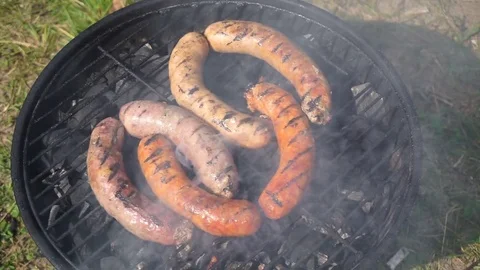 Sausages are fried on coals Stock Footage 82467352