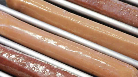 Sausages on the automatic grill Stock Footage 85737587