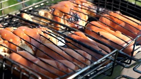 Sausages on the barbecue grill Stock Footage 63847754
