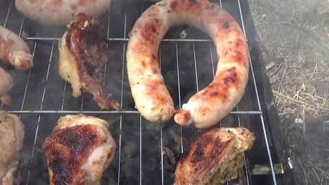 Sausages cooked on the nature Stock Footage 75242030