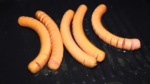 Sausages cooking Stock Footage 46295038