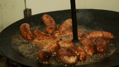 Sausages Cooking In Pan Stock Footage 294979460