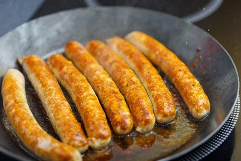 Sausages Cooking in a Pan 스톡 사진