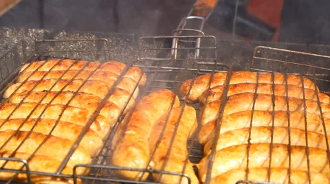 Sausages fried on a grill Stock-Footage 41447397