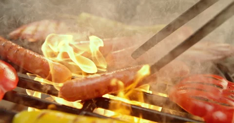 Sausages getting cooked on the grill Stock Footage 311826708