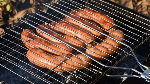 Sausages on the grill Stock Footage 118300495