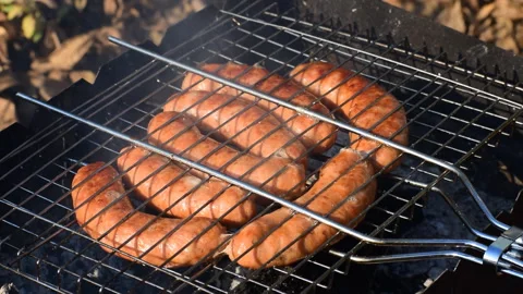 Sausages on the grill Stock Footage 118300685