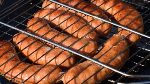 Sausages on the grill Stock Footage 118301401