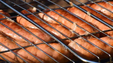 Sausages on the grill Stock Footage 118302287