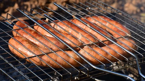 Sausages on the grill Stock Footage 118302747