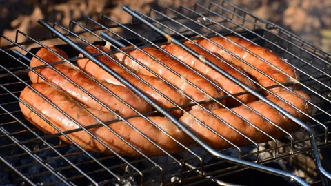 Sausages on the grill Stock Footage 118302812