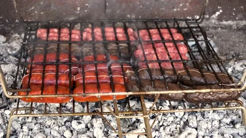 Sausages on the grill Stock Footage 162817735