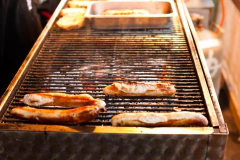 Sausages on the grill Stock Photos