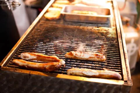 Sausages on the grill Stock Photos