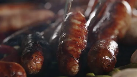 Sausages Grilling on BBQ: Macro Close-Up Footage Video stock 211751990