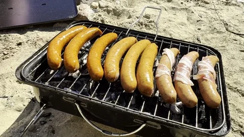 Sausages grilling Video stock 337364805