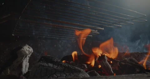 Sausages grilling over open fire barbecue 스톡 동영상 329923114