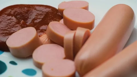Sausages with ketchup Stock Footage 254016248