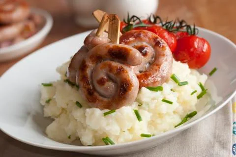 Sausages with mashed potatoes Stock Photos