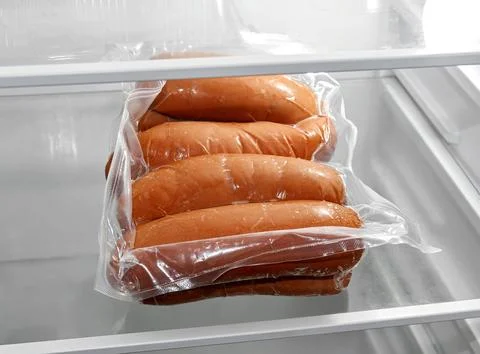 Sausages in a package Stock Photos