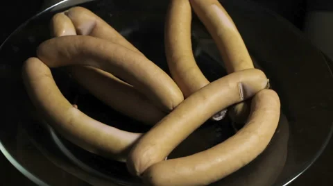 Sausages on a plate Stock Footage 57245007
