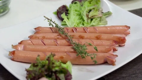 Sausages on the plate Stock Footage 71296810