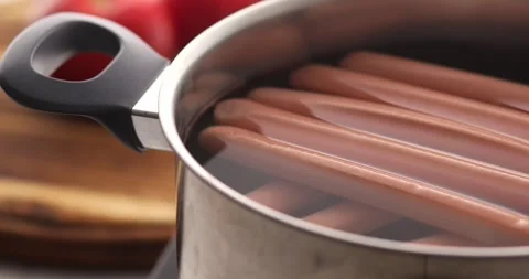 Sausages in a pot of water. Stock Footage 249225470