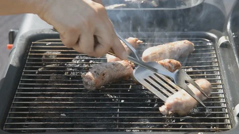 Sausages roasted on the grill Stock Footage 105914827