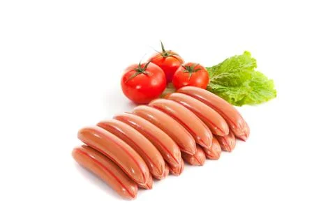 Sausages with vegetables Stock Photos