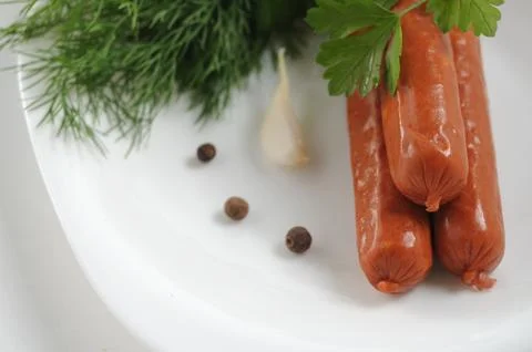 Sausages on a white background Stock Photos