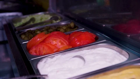 Sause and slices of vegetebles close-up. View from above Stock Footage 128009198