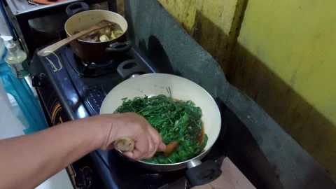Sauté the kale Stock Footage 231454860