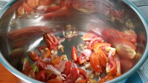 Saute Sliced Tomatoes inside a Casserole Stock Footage 159291199