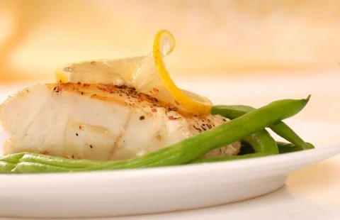 Sauted cod filet Stock Photos