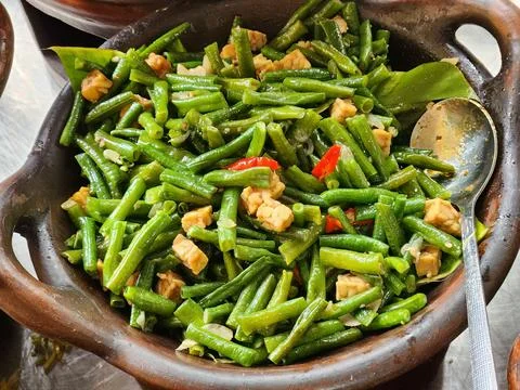 Sauteed beans prepared rustic clay bowl. Stock Photos