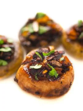 Sauteed button mushrooms Stock Photos