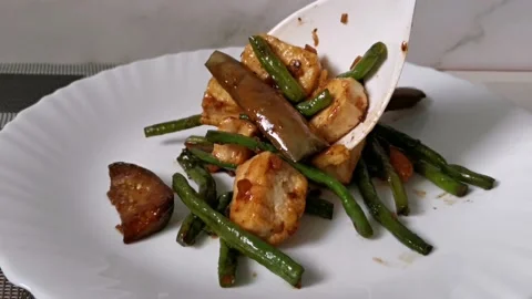 Sauteed Mixed Vegetables in a Serving Plate Stock Footage 234882342