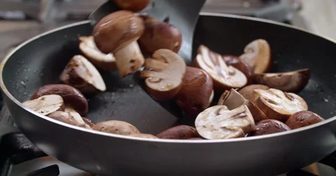 Sauteed mushrooms in pan Video stock 60781083