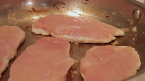 Sautéing Chicken Stock Footage 11016509