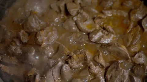 Sauteing Chicken Liver in Close Up Macro Texture with Savory Brown Sauce Stock Footage 339067748