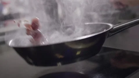Sauteing Glossy Red Fruit in Steaming Pan, Commercial Kitchen, Close Up Shot Vídeos de archivo 341422713