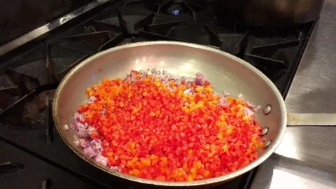 Sauteing Peppers in Restaurant 스톡 동영상 82211878