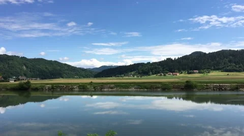 Sava river seen from a train driving through Slovenia Stock Footage 64750749