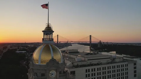 Savannah City Hall Sunset with Flag and Bridge Stock Footage 129057907
